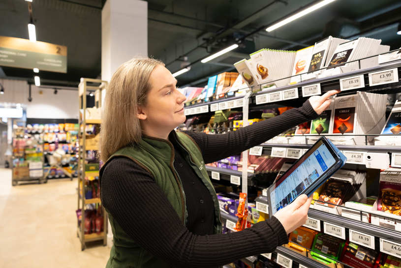Store Operational Excellence - Kavanagh's - Jodie - Employee with tablet